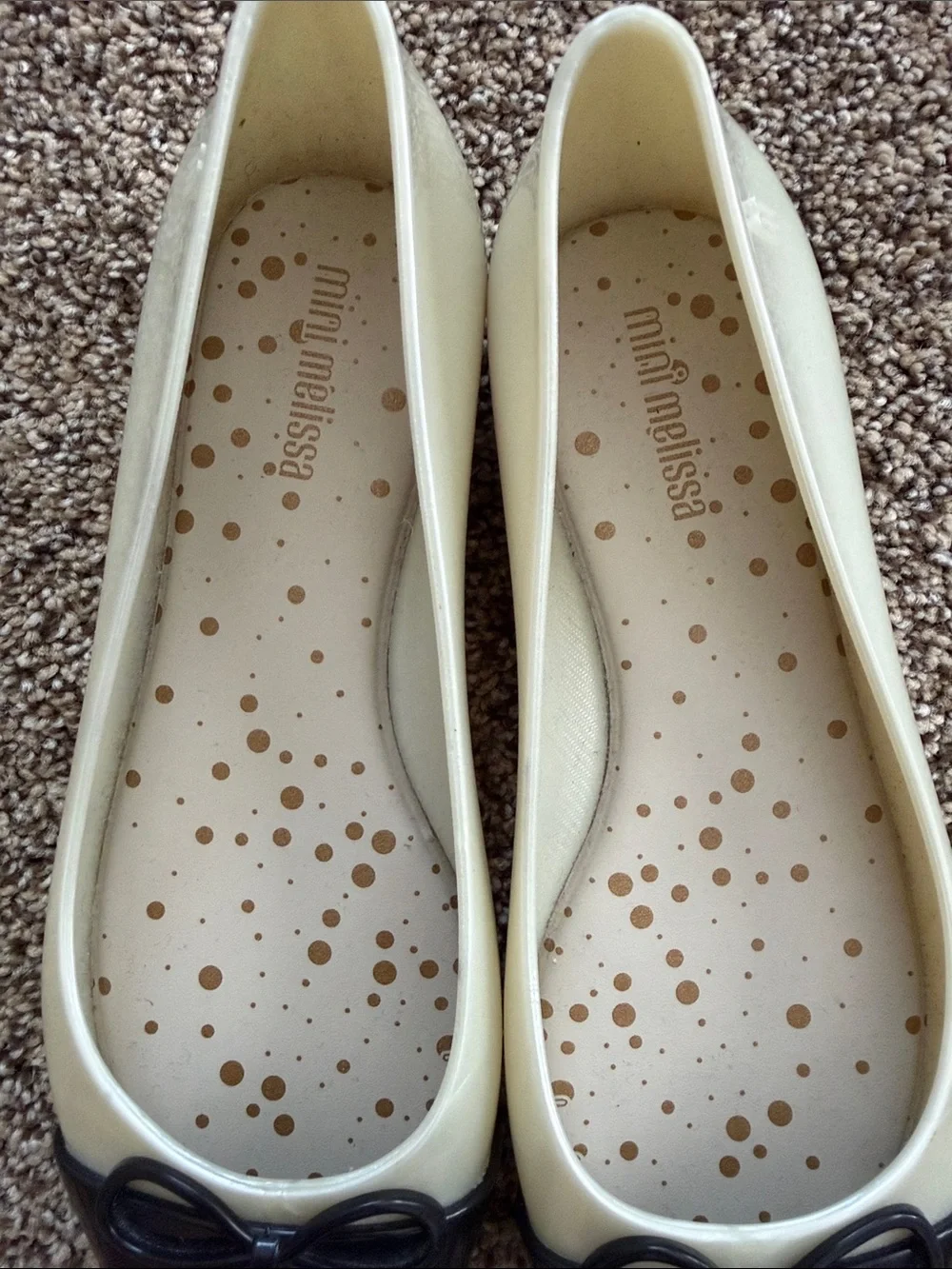 Mini Melissa Ivory Ballet Flats with Black Cap Toe and Bow